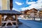 Livigno village, street view with old wooden water wheel, Italy, Alps