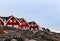 Living Inuit houses standing in the row among the rocks Nuuk, Gr