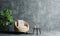 Living room with armchair sofa and Monstera plant on empty and copy space loft concrete wall background. Interior and architecture