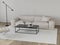 Living room in beige tones with leather sofa, metal table, po