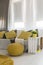 Living room with energetic yellow details