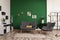 Living room interior stylish sofa near green wall