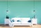 Living room interior - white leather sofa and green wall panel with space