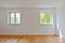 Living room in an old building - Apartment with wooden windows and parquet flooring after renovation