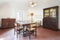 Living room, old interior with table and four chairs