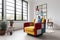 A living room with a Piet Mondrian-inspired armchair as the centerpiece. The armchair is geometric and colorful, with bold red, bl