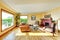 Living room with red brick fireplace