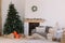 Living room in Scandinavian style with Christmas decor. Holiday background. New Year decorations