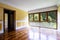 Living room with vintage parquet and large windows