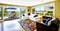 Living room with walkout deck and bay view. Tacoma real estate,