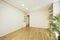 Living room with white lacquered wood carpentry, plaster shelves