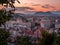 Ljubjana city view form castle hill during sunset with mountains in the background