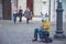 Ljubljana/Slovenia - April 28, 2018: funny street artist singing and wearing a cow head mask