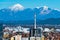 Ljubljana, Slovenia: Ljubljana cityscape with snowy mountains on the background