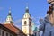 LJUBLJANA, SLOVENIA: St Nicholas Church in Ljubljana with the Fountain of three carniolan rivers Robba Fountain in the foregroun