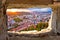 Ljubljana sunset through stone window aerial view