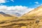 Llama, alpaca herding Road Cusco- Puno,Peru,South America. Sacred Valley of the Incas. Spectacular nature of mountains and blue