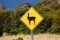 A llama warning road sign