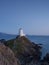 Llanddwyn lighthouse in fading light.