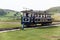 LLandudno, Wales, North Shore Beach, UK - MAY 27, 2018 Famous vintage tram Great Orme Mountain tramway makes its mountain public t