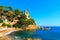 Lloret de Mar Castle and the beach on a sunny day