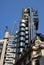 he Lloyds building with the pointed spire of The Scalpel behind in London, UK
