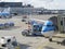 LM plane being loaded at Schiphol Airport