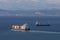 Loaded cargo ship leaving the port in Koper, Slovenia