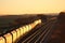 Loaded coal train in evening sunlight near York