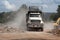 Loaded Dump Truck Leave Demolition Site