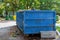 Loaded dumpster near a construction