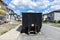 Loaded dumpster near a construction site