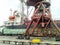 Loaded freight cars in the port. Passage of cars under the tower