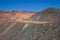 A loaded haulpak driving from the bottom of the Kalgoorlie Super Pit, one of the largest gold mines in the World. Gold was