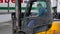 Loader sits in electric forklift