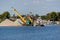 Loading barge with sand and rubble on a small berth. Freight transport logistics. Russia, Moscow region, August 2108