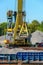 Loading barge with sand and rubble on a small berth. Freight transport logistics. Russia, Moscow region, August 2108