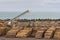 Loading belt and timber at harbor in Napier, New Zealand.