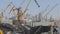 Loading bulk materials into the ship, loading the cargo ship with cranes in the port. Cargo ships in port loading them