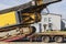 Loading of a drilling rig for the installation of bored piles onto a trawl for transportation to the place of work. Powerful