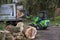 Loading felled and cut tree onto a truck.