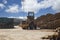 Loading logs with a special loader.Timber products warehouse on a specialized site