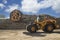 Loading logs with a special loader.Timber products warehouse on a specialized site