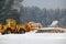 Loading lumber. Forest logs, unload the tractor. Forest industry.