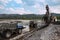 Loading of mountain soil into a dump truck bucket