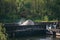 Loading nitrogen fertilizers with crane on a barge on the river