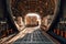 Loading transport aircraft in the hangar of cargo terminal. Inside view of the cargo hold of the aircraft during loading