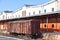 Loading and unloading of railway cars, boxcar and containers at temporary storage warehouses. Customs warehouse with a ramp.