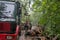 Loading wooden logs on mountain road 01