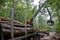 Loading wooden logs on mountain road 03